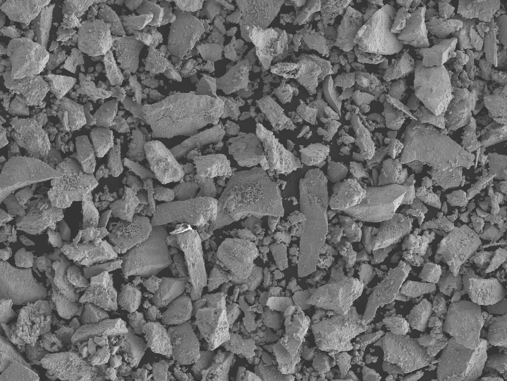 SEM image showing irregular morphology of tantalum carbide TaC powder particles