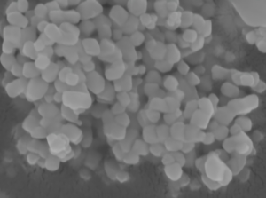SEM image of Indium Oxide Powder Properties showing particle morphology and aggregation characteristics.